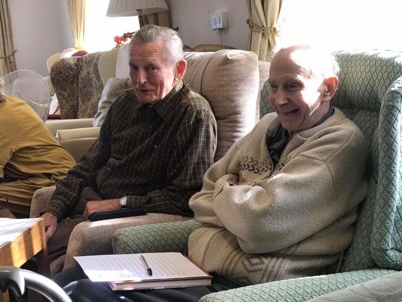 Two residents enjoying a quiz a Culrose House